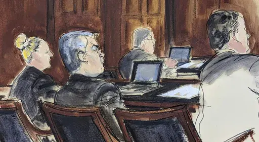 In this courtroom sketch in Federal court, in New York, Tuesday, Feb. 20, 2024, former Honduran President Juan Orlando Hernandez, seated center at the defense table, is flanked by his attorneys at the start of his trial. Nearly two years after his arrest and extradition to the U.S., Hernandez went on trial Tuesday in Manhattan federal court on drug trafficking and weapons charges. (Elizabeth Williams via AP)