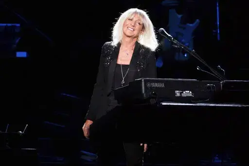 Christine McVie from the band Fleetwood Mac performs at Madison Square Garden in New York on Oct. 6, 2014. McVie, the soulful British musician who sang lead on many of Fleetwood Mac’s biggest hits, has died at 79. The band announced her death on social media Wednesday. (Photo by Charles Sykes/Invision/AP, File)