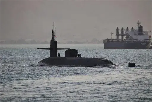 This photo released by the US Navy show a guided-missile submarine capable of carrying up to 154 Tomahawk missiles. The Navy said nuclear-powered submarine, based out of Kings Bay, Georgia, passed through the Suez Canal on Friday, April 7, 2023. (US Navy via AP)