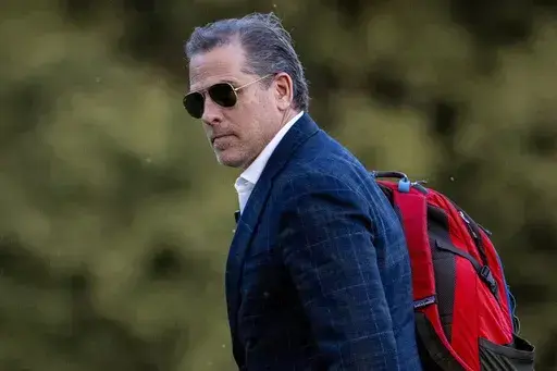 Hunter Biden, the son of President Joe Biden, walks from Marine One upon arrival at Fort McNair, June 25, 2023, in Washington. Hunter Biden has been indicted on nine tax charges in California as a special counsel investigation into the business dealings of the president's son intensifies against the backdrop of the looming 2024 election.(AP Photo/Andrew Harnik, File)