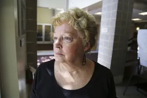 Clela Rorex, who was elected and served as Boulder County clerk and recorder in the 1970s, stands outside the offices of then-County Clerk Hillary Hall, in Boulder, Colo., on July 2, 2014. Rorex, a former Colorado county clerk considered a pioneering ally to the gay rights movement for being the first public official to issue a same-sex marriage license in 1975, has died at age 78. Rorex died Sunday, June 19, 2022, of complications from recent surgery at a hospice care facility in Longmont, the 