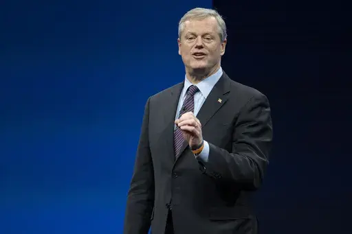 Incoming NCAA president Charlie Baker speaks during the NCAA Convention, Thursday, Jan. 12, 2023, in San Antonio. NCAA President Charlie Baker wants a federal law to regulate the way college athletes can be compensated for name, image and likeness that creates a registry of deals, agent certification and uniform contract standards. (AP Photo/Darren Abate, File)