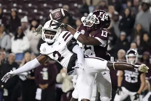 Mississippi State cornerback Esaias Furdge (2) breaks up a pass intended for Texas A&M wide receiver Micah Tease (13) in the end zone during the fourth quarter of an NCAA college football game Saturday, Nov. 11, 2023, in College Station, Texas. (AP Photo/Sam Craft)