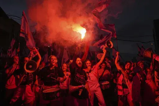 Israelis protest against plans by Prime Minister Benjamin Netanyahu's government to overhaul the judicial system, in Tel Aviv, Israel, Saturday, July 8, 2023. (AP Photo/Tsafrir Abayov)