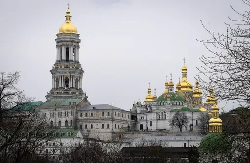 The Monastery of the Caves, also known as Kyiv-Pechersk Lavra, one of the holiest sites of Eastern Orthodox Christians, in Kyiv, Ukraine, Thursday, March 23, 2023. Tensions are on the rise at a prominent Orthodox monastery in Kyiv where the monks are facing eviction later this month. The Ukrainian government accuses the monks of links to Moscow, even though they claim to have severed ties with the Russian Orthodox Church following Russia's full-scale of invasion of Ukraine. (AP Photo/Efrem Lukat