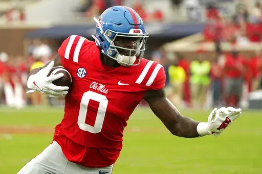 Mississippi tight end Michael Trigg catches a seven-yard touchdown pass against Central Arkansas during the first half of an NCAA college football game in Oxford, Miss., Saturday, Sept. 10, 2022. (AP Photo/Rogelio V. Solis)