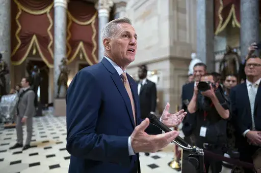 Speaker of the House Kevin McCarthy, R-Calif., talks to reporters at the Capitol in Washington, Monday, July 17, 2023. House conservatives in a group known as the Freedom Caucus have unveiled a list of demands that they want included in a stopgap spending measure to keep the federal government running after the end of September. It's a smorgasbord of non-starters for the Democratic-controlled Senate and the White House, signaling the challenges McCarthy will face next month to get a bill passed 