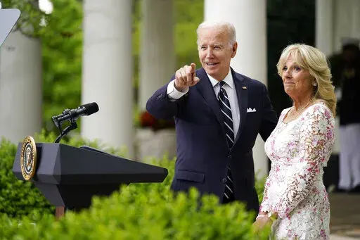 President Joe Biden points to Mexico's first lady Beatriz Gutierrez Muller as first lady Jill Biden watches as he speaks during a Cinco de Mayo event in the Rose Garden of the White House, May 5, 2022, in Washington. Jill Biden says she and the president don't hash out disagreements in front of other people, but argue instead by text. “Fexting” is what they call it. The first lady has revealed that and more in a new interview in the June-July issue of Harper's Bazaar. (AP Photo/Evan Vucci, F