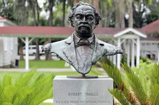 A bust of Robert Smalls, who will soon be the first African American individual with a statue at the South Carolina Statehouse, is displayed Reconstruction Era National Historic Park, Thursday, Sept. 12, 2024, in Beaufort, S.C. (AP Photo/Jeffrey Collins)