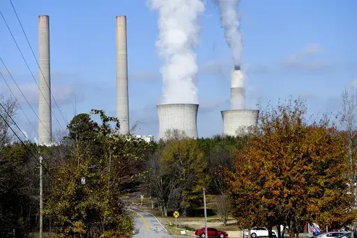 Plant Bowen, commonly known as Bowen Steam Plant, is a Coal power station, operating, Monday, Dec. 14, 2020, in Euharlee, Ga. The Georgia Public Service Commission approved a deal on Tuesday, April 16, 2024 that allows the company to contract for or build additional generation capacity. (AP Photo/Mike Stewart, File)
