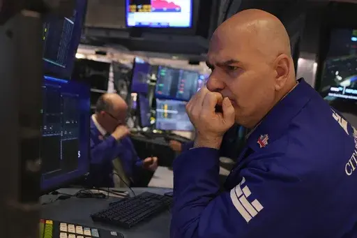 Specialist Philip Finale works on the floor of the New York Stock Exchange, Tuesday, March 11, 2025. (AP Photo/Richard Drew)