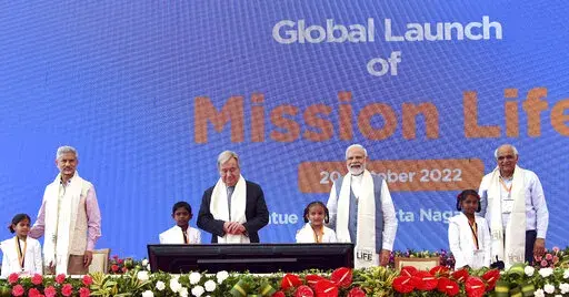 This photograph provided by India's Press Information Bureau shows U.N. Secretary General Antonio Guterres and Indian Prime Minister Narendra Modi at the launch of Mission Life, where “life” is an acronym for “lifestyle for environment,” in Kevadia, in the western Indian state of Gujarat, Thursday, Oct. 20, 2022. The Indian government’s flagship program to encourage individual and collective action on climate is designed to encourage individual behaviors like switching off vehicle engi