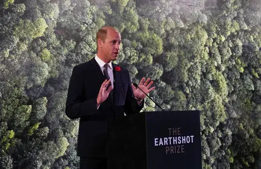 Britain's Prince William speaks during a meeting with Earthshot prize winners and finalists at the Glasgow Science Center on the sidelines of the COP26 U.N. Climate Summit in Glasgow, Scotland, Nov. 2, 2021. The conservation charity founded by the prince, who launched the Earthshot Prize, keeps its investments in a bank that is one of the world’s biggest backers of fossil fuels. (AP Photo/Alastair Grant, Pool, File)