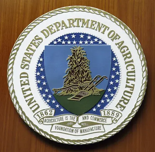 The logo of the United States Department of Agriculture is seen, Aug. 10, 2007, at the US Embassy in Berlin. (AP Photo/Michael Sohn, File)