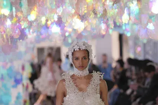 A model wears a creation as part of the Susan Fang Fall/Winter 2025-2026 Women's collection presented in Milan, Italy, Sunday, March 2, 2025. (AP Photo/Antonio Calanni)
