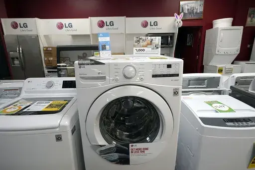 Washing machines are displayed at Sam's Appliances TV & Furniture, on March 25, 2021, in Norwood, Mass. On Thursday, the Labor Department reports on U.S. consumer prices for July. Economists expect the report to show prices rose 3.3%. (AP Photo/Steven Senne, File)