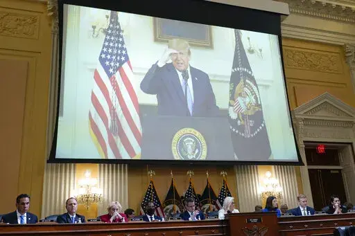 A video of President Donald Trump recording a statement on Jan. 7, 2021, is played, as the House select committee investigating the Jan. 6 attack on the U.S. Capitol holds a hearing at the Capitol in Washington, July 21, 2022. The House Jan. 6 committee is eyeing a close to its work and a final report laying out its findings about the U.S. Capitol insurrection by the end of the year. But the investigation is not over. (AP Photo/J. Scott Applewhite, File)