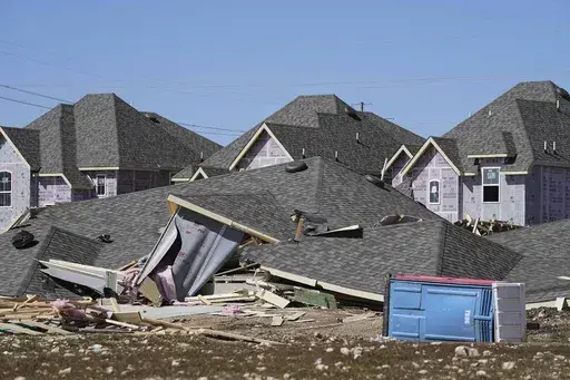 Homes that were under construction sit destroyed after recent severe weather that passed through the area in Haslet, Texas, Wednesday, March 5, 2025. (AP Photo/Tony Gutierrez)