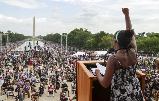 Yolanda Renee King, granddaughter of The Rev. Martin Luther King Jr., raises her fist as she speaks during the March on Washington, on the 57th anniversary of the Rev. Martin Luther King Jr.'s "I Have a Dream" speech on Aug. 28, 2020. California's first-in-the-nation task force on reparations is at a crossroads with members divided on which Black Americans should be eligible for compensation. The task force could vote on the question of eligibility on Tuesday, March 28, 2022, after putting it of