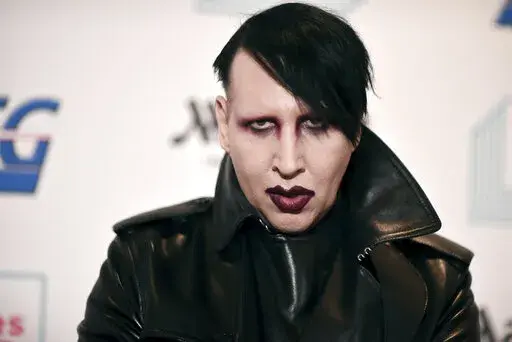Marilyn Manson attends the 9th annual "Home for the Holidays" benefit concert on Dec. 10, 2019, in Los Angeles. Detectives have handed the results of their 19-month investigation into sexual assault allegations against Manson to prosecutors, who will consider whether to file criminal charges, authorities said Tuesday, Sept. 20, 2022. (Photo by Richard Shotwell/Invision/AP, File)