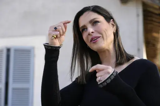 Olivia Maurel, who was born through surrogacy and is against such practice is interviewed by the Associated Press in Rome, Thursday, April 4, 2024. Maurel met with Pope Francis and attended an International Conference of the Casablanca Declaration, an international campaign for the abolition of surrogacy calling for the adoption of an international treaty. (AP Photo/Gregorio Borgia)