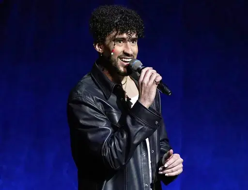 Bad Bunny speaks at the Sony Pictures Entertainment presentation at CinemaCon 2022 in Las Vegas on April 25, 2022. In March 2023, Bad Bunny’s ex–girlfriend is suing the superstar for at least $40 million over a well-known voice recording she provided the singer before he became famous. (AP Photo/Chris Pizzello, File)