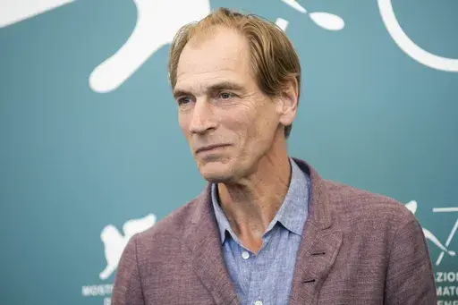 Actor Julian Sands poses for photographers at the Venice Film Festival in Venice, Italy, on Sept. 3, 2019. Sands, who starred in several Oscar-nominated films in the late 1980s and 90s including “A Room With a View” and “Leaving Las Vegas,” was found dead on a Southern California mountain five months after he disappeared while hiking, authorities said Tuesday, June 27, 2023. (Photo by Arthur Mola/Invision/AP, File)
