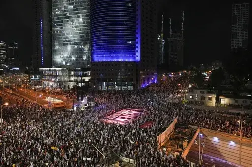 Israelis protest against plans by Prime Minister Benjamin Netanyahu's government to overhaul the Israel's judicial system, in Tel Aviv, Israel, Saturday, March 18, 2023. (AP Photo/Tsafrir Abayov)