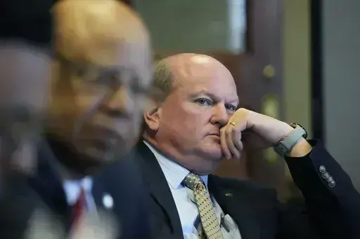 Mississippi State Senate Judiciary B Committee member Sen. Brice Wiggins, R-Pascagoula, listens as committee members review legislation that would restore suffrage for some people convicted of felonies in the past, Monday, April 22, 2024, at the state Capitol in Jackson, Miss. The bills that were approved by the committee will be presented before the state Senate for its approval. (AP Photo/Rogelio V. Solis)