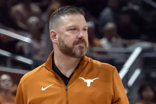 Texas head coach Chris Beard looks on during the first half an NCAA college basketball game against UTEP on Nov. 7, 2022, in Austin, Texas. Mississippi has hired Chris Beard as basketball coach five weeks after his firing from Texas following a domestic violence arrest. The Rebels announced Beard's hiring on Monday, March 13, 2023, and will introduce him Tuesday in a public event at the SBJ Pavilion. (AP Photo/Michael Thomas, File)