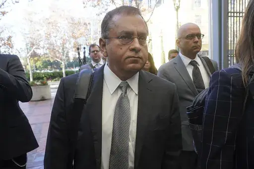 Ramesh "Sunny" Balwani, the former lover and business partner of Theranos CEO Elizabeth Holmes, arrives at federal court in San Jose, Calif., on Dec. 7, 2022. On Thursday, March 9, 2023, a federal judge rejected Balwani’s bid to remain free while he appeals his conviction for crimes he committed during a blood-testing scam that he orchestrated with Elizabeth Holmes. (AP Photo/Jeff Chiu, File)