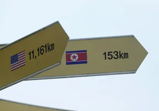 Destination signs to North Korea's capital Pyongyang and the United States are seen at the Imjingak Pavilion in Paju, South Korea, near the border with North Korea, Thursday, July 20, 2023. North Korea wasn't responding Thursday to U.S. attempts to discuss the American soldier who bolted across the heavily armed border and whose prospects for a quick release are unclear at a time of high military tensions and inactive communication channels. (AP Photo/Ahn Young-joon)
