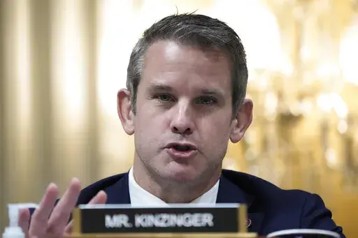 Rep. Adam Kinzinger, R-Ill., speaks as the House select committee investigating the Jan. 6 attack on the U.S. Capitol Hill in Washington on Dec. 19, 2022. The Open Field, a Penguin Random House imprint overseen by Maria Shriver, announced Tuesday that Kinzinger’s “Renegade: My Life in Faith, the Military, and Defending America from Trump’s Attack on Democracy” is scheduled for on release Oct. 17. (AP Photo/Jacquelyn Martin, File)