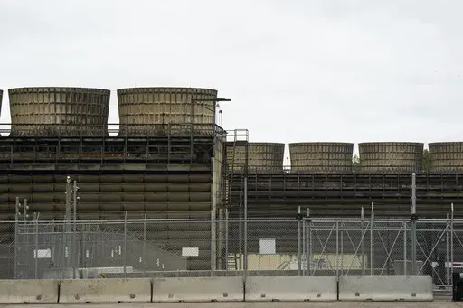 Cooling towers release heat generated by boiling water reactors at Xcel Energy's Nuclear Generating Plant on Oct. 2, 2019, in Monticello, Minn. Minnesota regulators said Thursday, March 16, 2023, that they're monitoring the cleanup of a leak of 400,000 gallons of radioactive water from Xcel Energy's Monticello nuclear power plant in late November 2022. The company said there's no danger to the public. (Evan Frost/Minnesota Public Radio via AP, File)