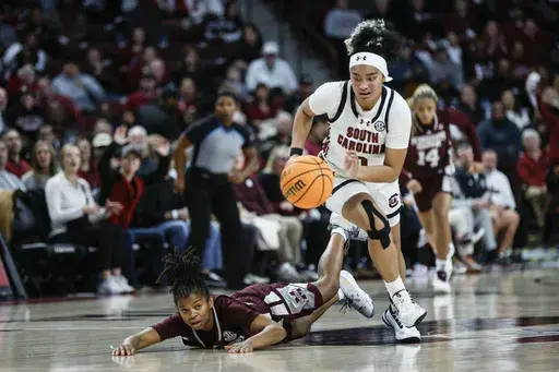 South Carolina guard Te-Hina Paopao, right, steals the ball from Mississippi State guard Lauren Park-Lane during the first half of an NCAA college basketball game in Columbia, S.C., Sunday, Jan. 7, 2024. (AP Photo/Nell Redmond)