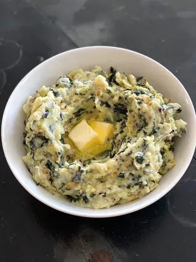 A recipe for Colcannon, a classic Irish medley of mashed potatoes and greens, appears in New Milford, Conn., on Feb. 28, 2022. (Katie Workman via AP)