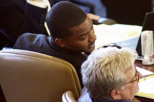 Sheldon Timothy Herrington Jr., left, who is on trial in the 2022 death of University of Mississippi student Jimmie "Jay" Lee, confers with his defense attorney Kevin Horan in Oxford, Miss., Saturday, Dec. 7, 2024. (Ashley Charles/The Daily Mississippian via AP, Pool)