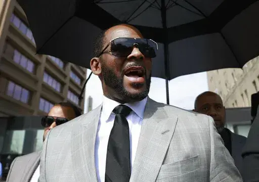 Musician R. Kelly leaves the Leighton Criminal Court building in Chicago on June 6, 2019. Kelly’s federal trial starts Monday in Chicago. (AP Photo/Amr Alfiky, File)