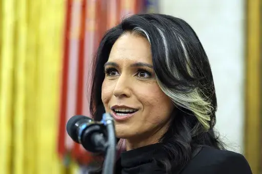 Director of National Intelligence Tulsi Gabbard listens to President Donald Trump during her swearing-in at the Oval Office of the White House, Feb. 12, 2025, in Washington. (Photo/Alex Brandon, File)