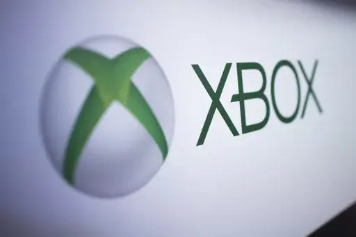 The Xbox logo is pictured at the Paris Games Week in Paris, Nov. 3, 2017. Several exclusive Xbox games will be soon making their way to rival consoles, the video gaming brand and its parent company Microsoft announced Thursday, Feb. 15, 2024. (AP Photo/Kamil Zihnioglu, File)