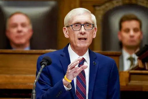 Wisconsin Gov. Tony Evers addresses a joint session of the Legislature in the Assembly chambers during the governor's State of the State speech at the state Capitol on Tuesday, Feb. 15, 2022, in Madison, Wis. Evers, who is up for reelection in November, vetoed a package of bills on Friday, April 8, 2022, passed by the Republican-controlled Legislature that would have made a series of changes to the battleground state's election laws. (AP Photo/Andy Manis, File)