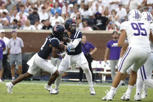 Mississippi quarterback Jaxson Dart (2) passes the ball during the first half of an NCAA college football game against Furman, Saturday, Aug. 31, 2024, in Oxford, Miss. (AP Photo/Sarah Warnock)