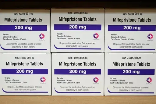 Boxes of the drug mifepristone sit on a shelf at the West Alabama Women's Center in Tuscaloosa, Ala., March 16, 2022. An “anti-vice” law from the 19th century is at the center of a new court ruling that could soon halt access to the leading abortion drug in the U.S. On Friday, April 7, 2023, a Trump-appointed judge in Texas sided with Christian conservatives in ruling that the Comstock, enacted in the 1870s, prohibits sending the long-used drug through the mail. (AP Photo/Allen G. Breed, Fil