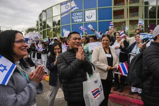 Thai citizens, who were released from Hamas captivity in Gaza as part of the Israel-Hamas ceasefire deal, leave Shamir Medical Center (Assaf Harofeh) in Be'er Ya'akov, Israel, Saturday, Feb. 8, 2025. (AP Photo/Ohad Zwigenberg)