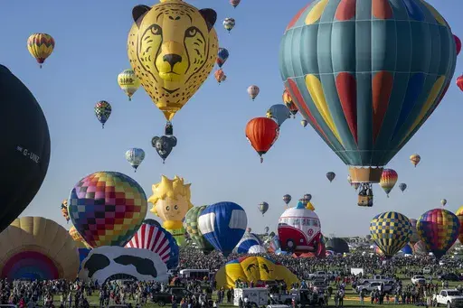 Nearly 500 balloons begin to take off during the Albuquerque International Balloon Fiesta, Oct. 7, 2023, in Albuquerque, N.M. (AP Photo/Roberto E. Rosales, File)