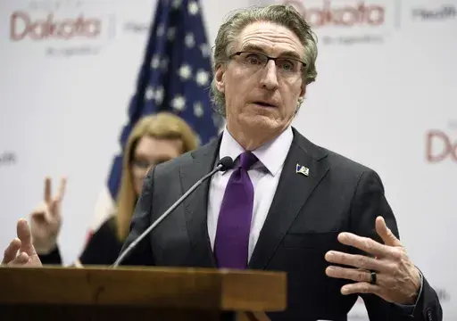 North Dakota Gov. Doug Burgum speaks at the state Capitol April 10, 2020, in Bismarck, N.D. (Mike McCleary/The Bismarck Tribune via AP, File)