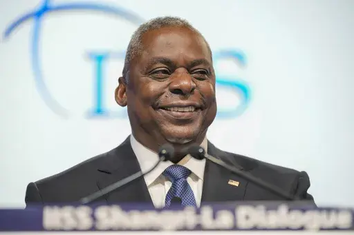 U.S. Secretary of Defense Lloyd J. Austin III smiles as he speaks during the 20th International Institute for Strategic Studies (IISS) Shangri-La Dialogue, Asia's annual defense and security forum in Singapore, Saturday, June 3, 2023. (AP Photo/Vincent Thian)
