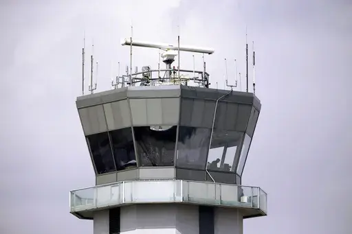 The air traffic control tower stands at Chicago's Midway International Airport, March 12, 2013. (AP Photo/M. Spencer Green, File)