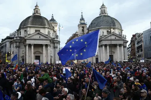 People protest during a pro-Europe rally in Rome’s central Piazza del Popolo, Italy, Saturday, March 15, 2025. (Cecilia Fabiano/LaPresse via AP)