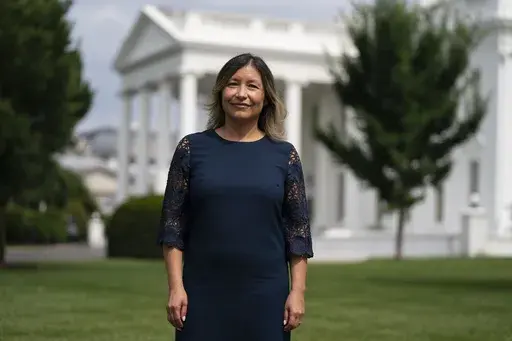White House Intergovernmental Affairs director Julie Chavez Rodriguez stands outside the White House, Wednesday, June 9, 2021, in Washington. The granddaughter of Cesar Chavez and a bronze bust of the late Latino labor activist have had prominent places in President Joe Biden’s White House. And now Julie Chavez Rodriguez is moving on from his White House staff to take another high-profile position at the helm of Biden's reelection campaign. (AP Photo/Evan Vucci, File)